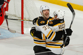 Zdeno Chara and Mark Recchi celebrate Recchi's 2nd goal of the game, his 1,500 career NHL point