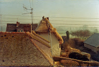 Re-thatching Well Cottage. November 1983.