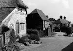 Owlscote Manor Farm from High Street. Sign of the Crown on left.