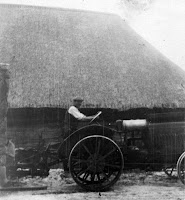 Barn at Middle Farm before fire. Daniel Greenough (Gwen's father) on tractor.