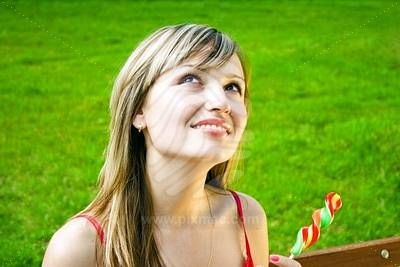 [beautiful-white-woman-with-sugar-candy-dreaming-or-praying-on-a[2].jpg]