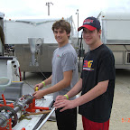 Jake French, 2008 SKUSA Supernats pole sitter, lays hands on Clint Korte's spare chassis.