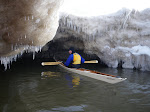 Doug inspecting an ice cave in his Betsie Bay valkyrie. http://keithwikle.com