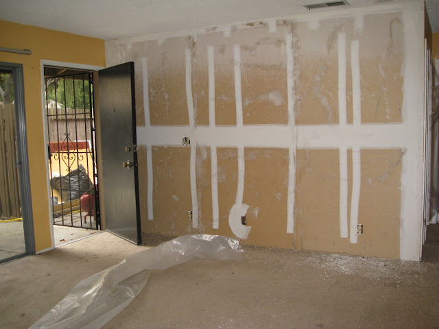 The walls used to be covered with dark RED wood panels.