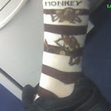 My See No, Hear No, Speak No Evil monkey socks.  (Jan, 2006)