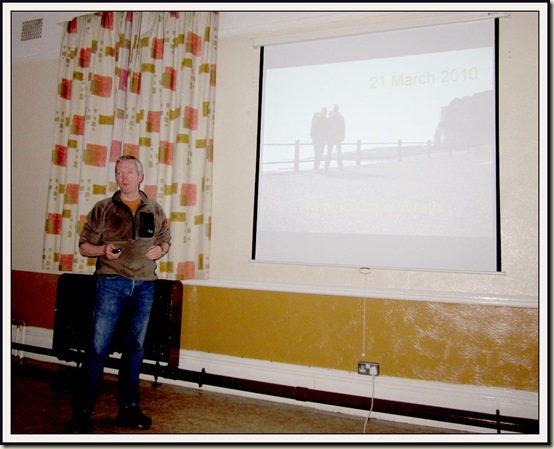 Mick, with his and Gayle's 'Kent to Cape Wrath' slide show