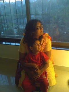 [Arjun and Nitya looking at the floor lamp[2].jpg]