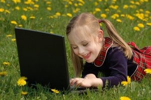 [300px-Happy_girl_on_laptop[6].jpg]