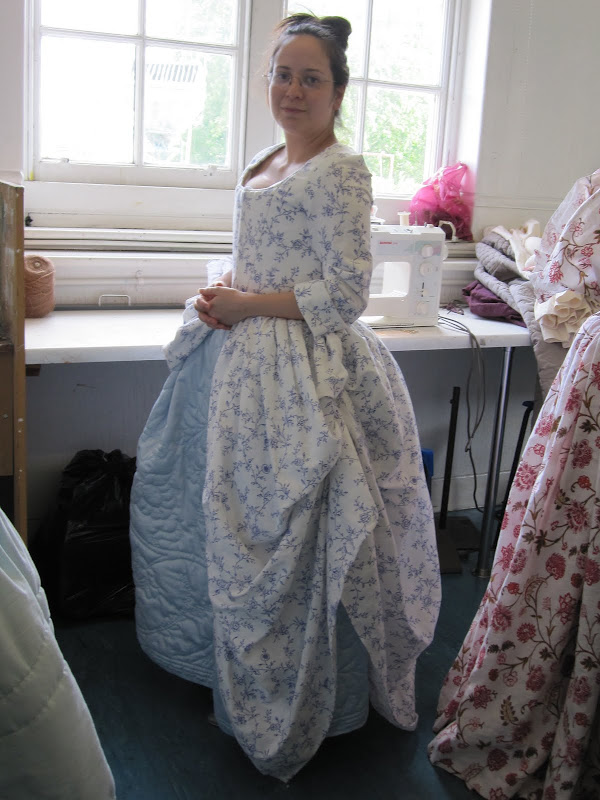 Final fitting. The overskirt has been tucked in to the pocket slits. Final fitting. The overskirt has been tucked in to the pocket slits.
