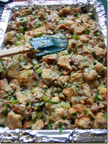 smoothing chestnut and sausage stuffing in pan