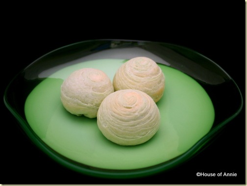 baked spiral pastries plated