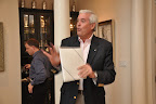 Mayor Mike Wiggins presenting a gift from the city