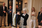 Julia Duffy admiring her gift from Mayor Mike Wiggins