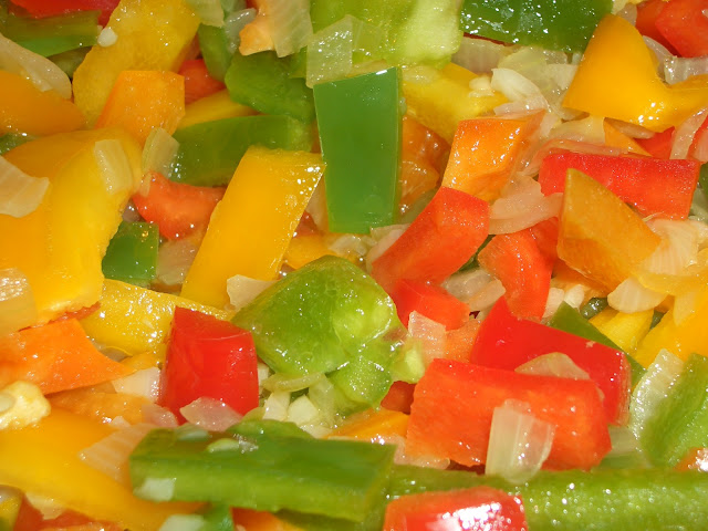 Fresh peppers and onions up close