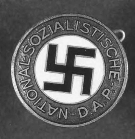 The official Nazi Party membership lapel pin: National-Sozialistische-D.A.P (National Socialist German Workers' Party).