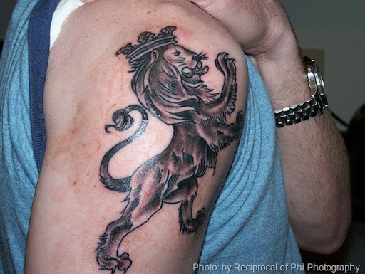Lion of Judah tattoos often incorporate the colours of the Ethiopian flag 