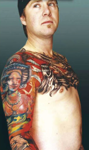 extreme tattoo on male body
