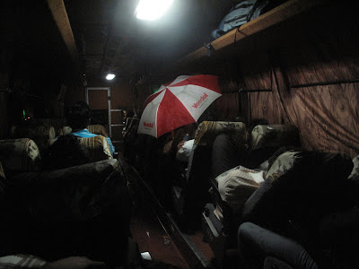 an umbrella in the bus. 