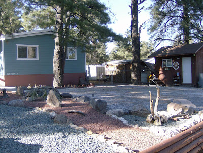 One of a kind, extensively remodeled 1440 sq.ft. manufactured home.Feels like a house with its many changes, including dry-walled walls.Well-built to begin with, this unusual home made even more solid and appealing bymany quality upgrades.  More changes are: wood floors, tile floors inkitchen and bathrooms, natural non-toxic Berber-carpets, and double-paned windowsHas both wood stove & central gas for heat.Perfect layout with 2 bedrooms on one side, master suite on the other.Master suite has been completely rebuilt and has many possible uses.  With walk-in closet; full bathroom; small bonus room (usable as office, changing room, waiting room, kitchenette or ...?) and separate entrance with sliding door that steps out to hot tub (negotiable) in sweet, private, fenced area.Two decks, storage sheds/workshop, artfully landscaped.Walking, biking distance to gorgeous wetlands & other trails; great for people with dogs or just people. Only half an hour from the top of Sedona.A house decorator friend, when viewing our home for the first time asked,   Why are you only asking 219,000 for this?  [recently reduced to 213,000].  I replied, Well, for one thing, its a manufactured home.  She exclaimed, Youre kidding!  It feels and looks like a house.  What an incredible job youve done!Many others have expressed similar sentiments.  Were interested in a trade for a house or land of comparable value in the Albuquerque area.  If youve got property in Albuquerque and like the looks of this one, give us a call or email!928-600-9660															Mesa  at Kachina Trail							(google map)				(yahoo map)					cats are OK - purrrdogs are OK - wooof Location: Flagstaff, AZits NOT ok to contact this poster with services or other commercial interests		