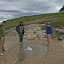 Active travertine-forming spring at Siva Brada, Slovakia. The Chapel of the Holy Cross (upper right) was built on top of the hill which formed from springs such as this one.