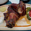 ... a 1.3 kg portion of roasted pig leg with mustard, horseradish and pickled vegetables, because you know - vegetables are healthy [photo by Lisa].