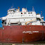 Atlantic Huron approaching the drawbridge on Welland Canal in St. Catharines (Ontario, Canada)