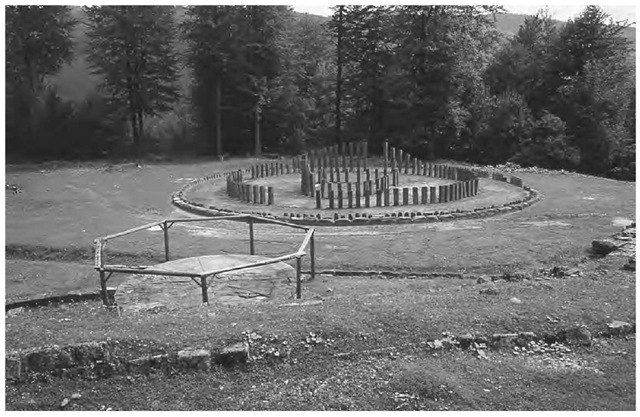 The large sanctuary at Sarmizegetusa Regia, Romania, with the "Andesite Sun" in the foreground. 