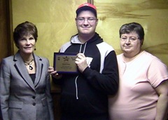 Doug Casey joined by Roxan Casey and Beth Harman for Community Hero award from 1-7-10