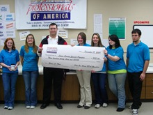 Ohio Hi-Point gives to Logan County Special Olympics 12-22-09