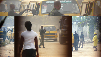 Armed police stopping motorists in Nigeria