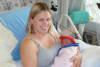 Our little ballplayer snuggling with Mommy