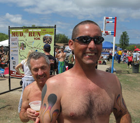 Keith applies sunscreen to Tom.....hey anything goes at the Camp Pendleton Mud Run