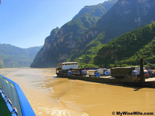 Land vehicles transported via water passage