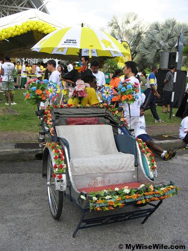 Penang Trishaw decorated with Digi umbrella Penang Trishaw decorated with Digi umbrella
