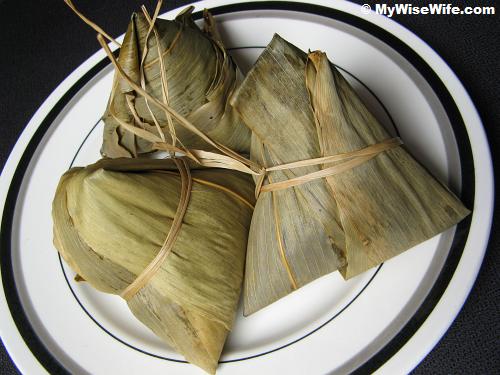 Zongzi or Rice dumplings wrapped in bamboo leaves Zongzi or Rice dumplings wrapped in bamboo leaves