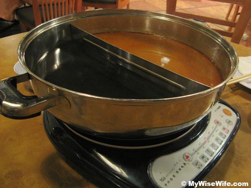 Two types of soups - Tomyam and Chinese Herbal Two types of soups - Tomyam and Chinese Herbal