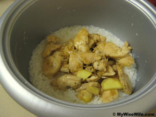 Add sauteed chicken into rice Add sauteed chicken into rice