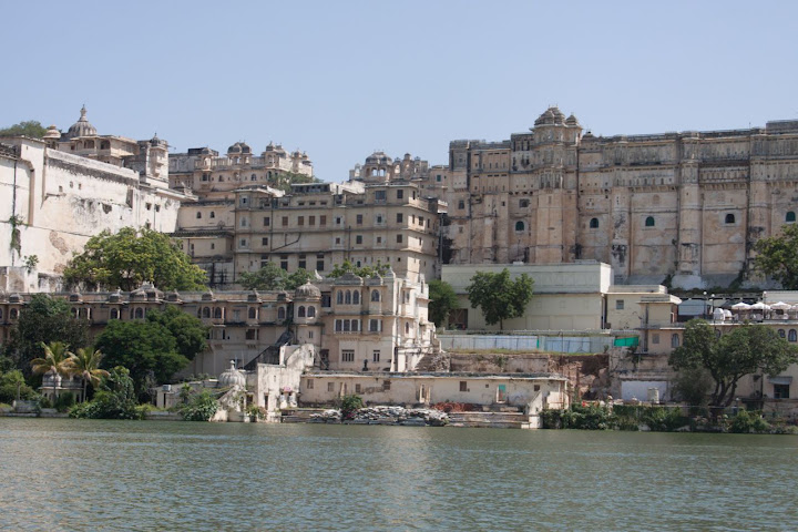 View of the Udaipur City Palace, as seen from a boat on the Lake Pichola in Udaipur