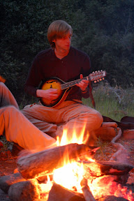 Mandolin player at the campfire