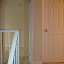 View from the top of the stairs. Notice the iron railing painted white now.