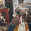 In the smoking room with some people.