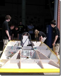 Kenwood Hoben, AJ Owman, Josh Allen, Madeline McAuley, and Mitch Panek prepare Sunseeker for unveiling