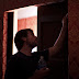 Kyle Graffam lays some finishing touches on our elevator doors