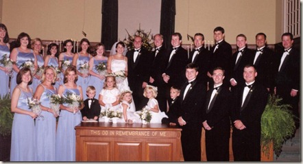 wedding party in front of church stacked