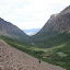 Already tired and exhausted we had to still make it down this valley towards the water. Unfortunately the trail (easy to loose) took us up and down the left side of the valley for the next hour or two, keeping us high in the wind and cold.