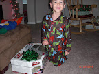 Joshua is the first to wake up and find a gift from Santa