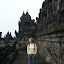 Gill on one of the many tiered walkways inside Borobudur