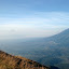 A glimpse of Semuru thought the haze