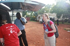 Suzy, Kiganda and Suzanne packing the car for a day in Kampala.