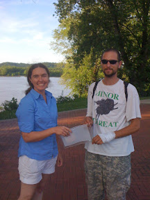 Joe Cox receiving the Prize Money from Simone Kompanek